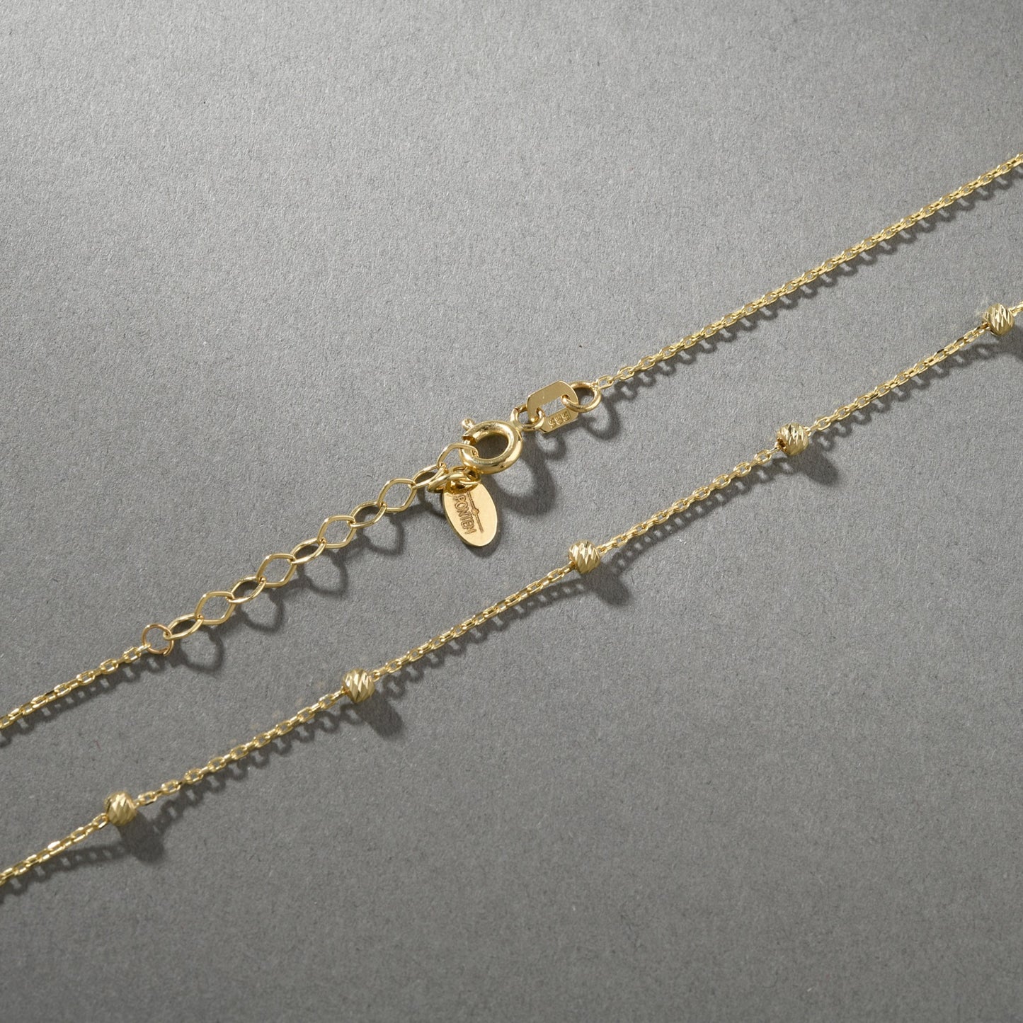 Dorika Ball Gold Necklace