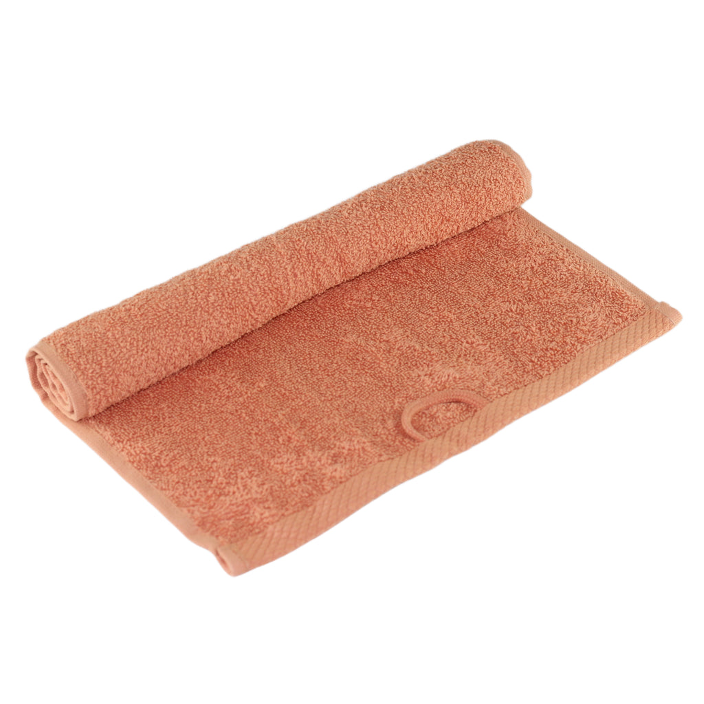 Inorien marka 500 gsm organik pamuk el ve yüz havlusu (30x50 cm), mercan renkte, yoğun dokusu görünecek şekilde katlanmış.
