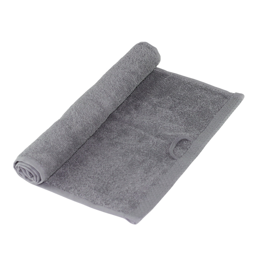 Inorien marka 500 gsm organik pamuk el ve yüz havlusu (30x50 cm), antrasit renkte, yoğun dokusu görünecek şekilde katlanmış.
